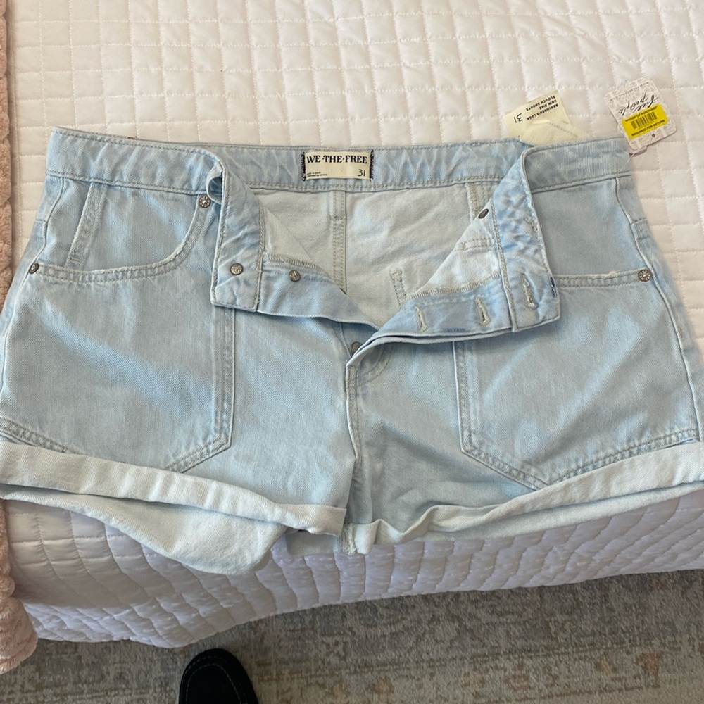 “We the Free”  Size 31 High Waisted Denim shorts.